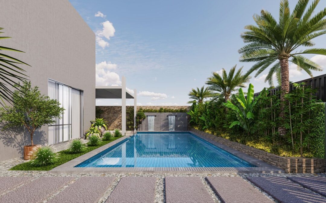 Une piscine rectangulaire moderne aménagée dans le jardin d'une propriété contemporaine, bordée de palmiers et de végétation tropicale.